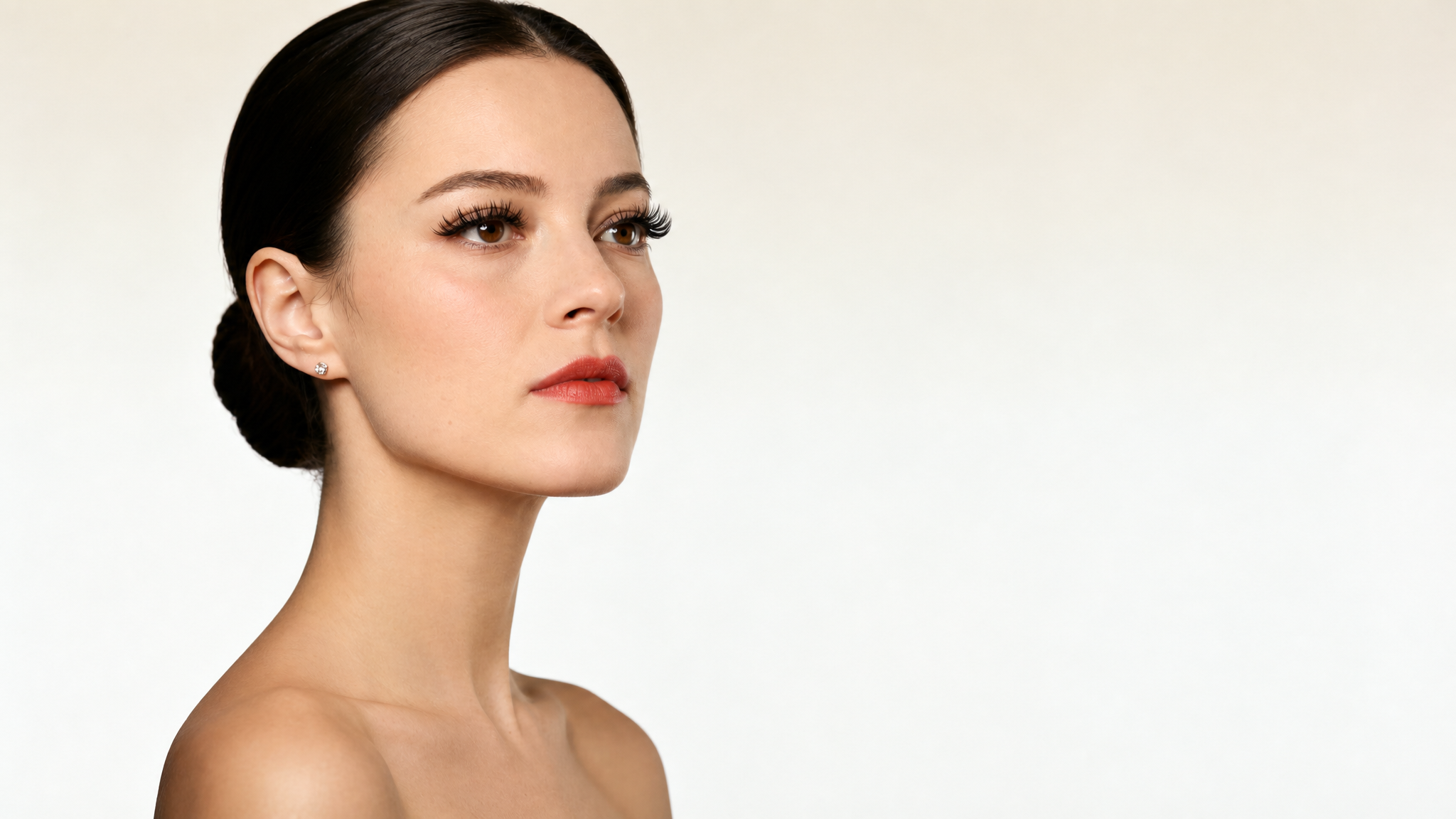 Elegant model portrait with dramatic lashes for collection showcase